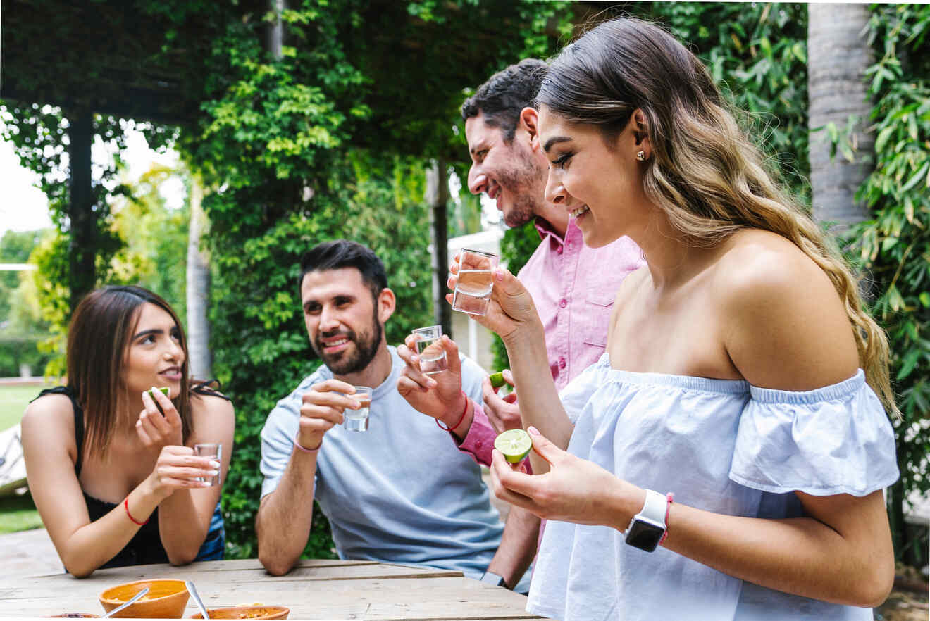 Group of people tasting mezcal