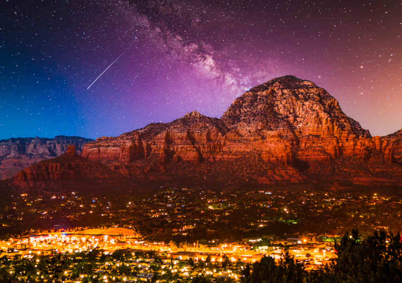 Aerial view of Sedona and the rocks at nigh with the Milky Way in the sky