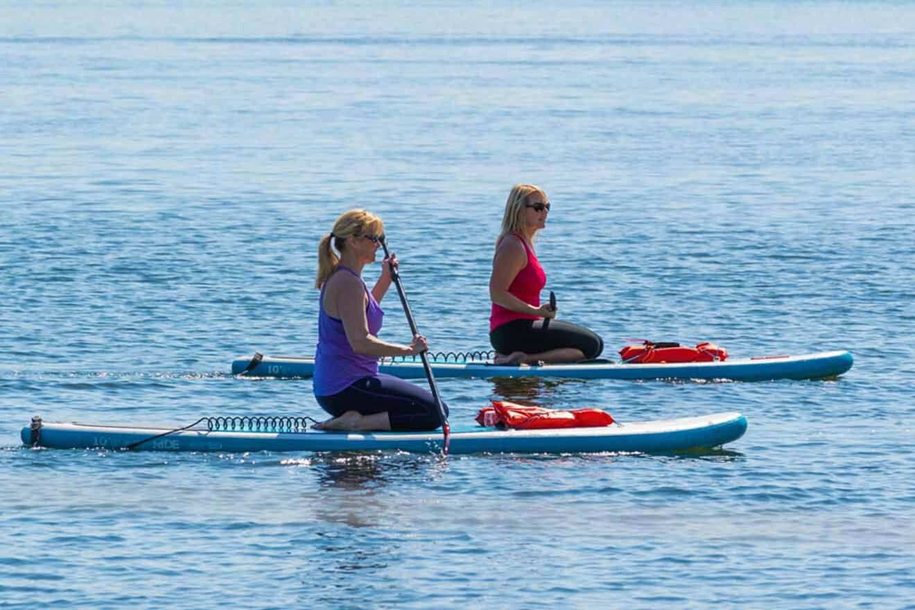women on paddle boards