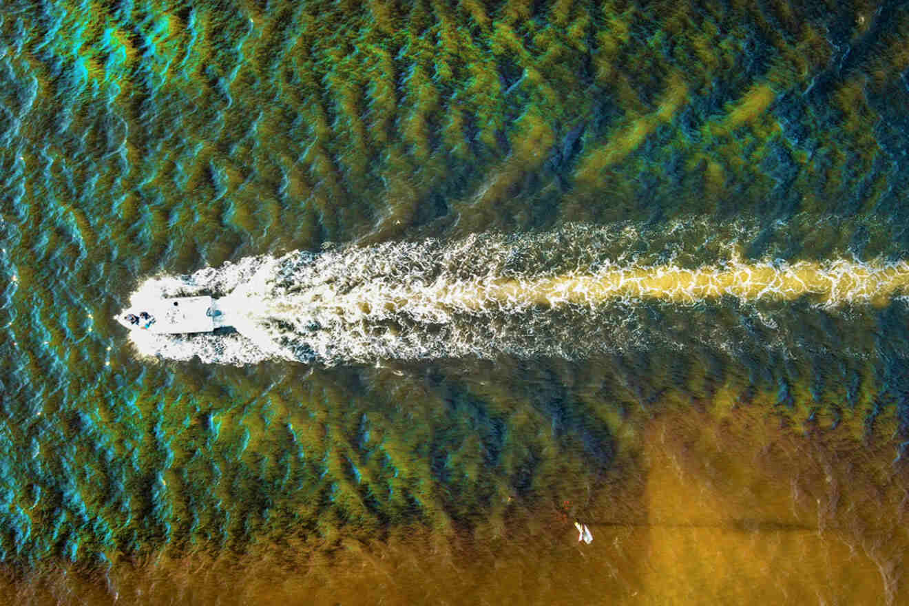 aerial view over Apollo Beach Nature Preserve and a boat
