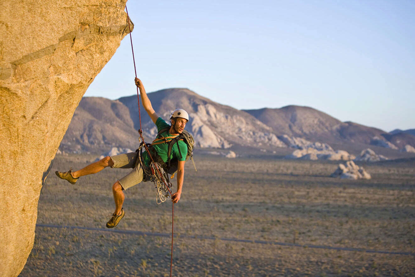 man rock climbing