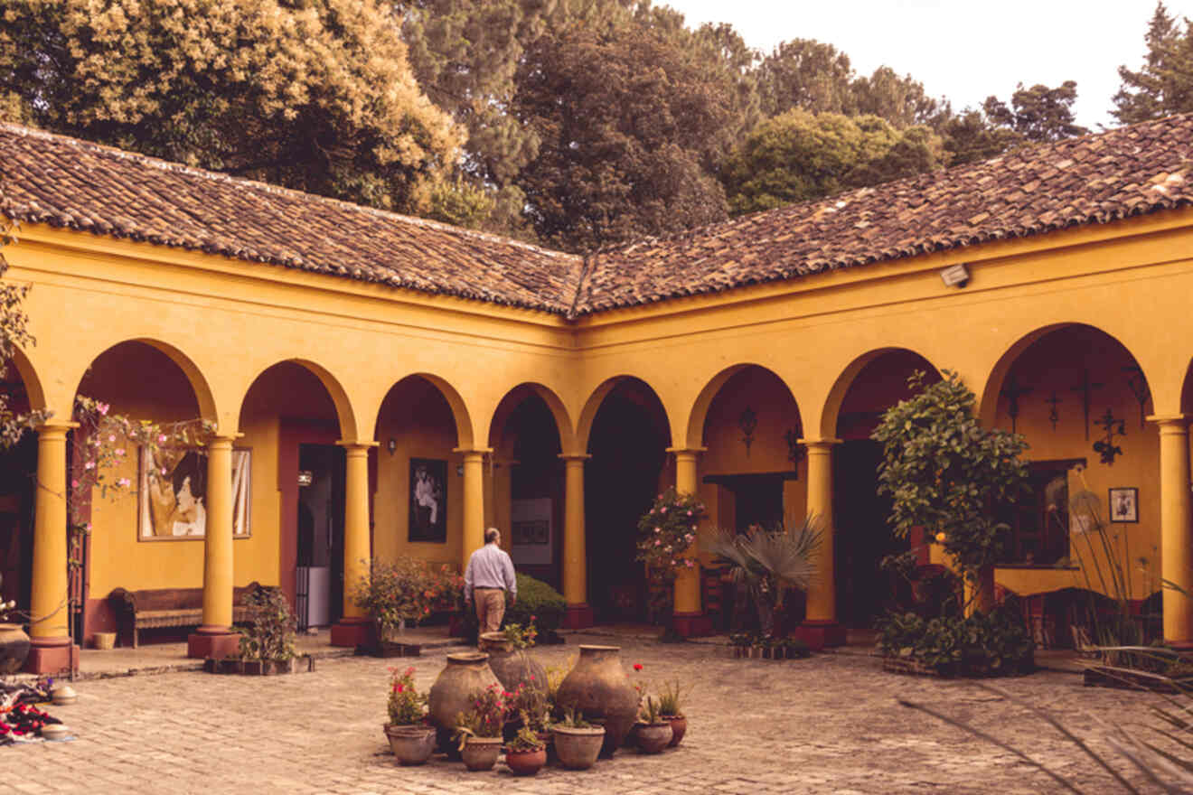 View of a man walking into Casa Na Bolom Museum