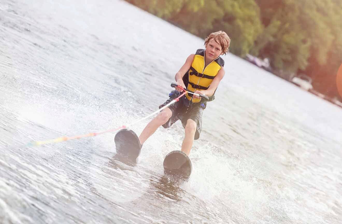 boy water skiing