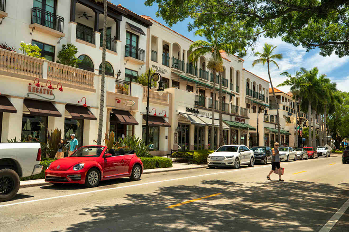 street with shops and parked cars at Fifth Avenue