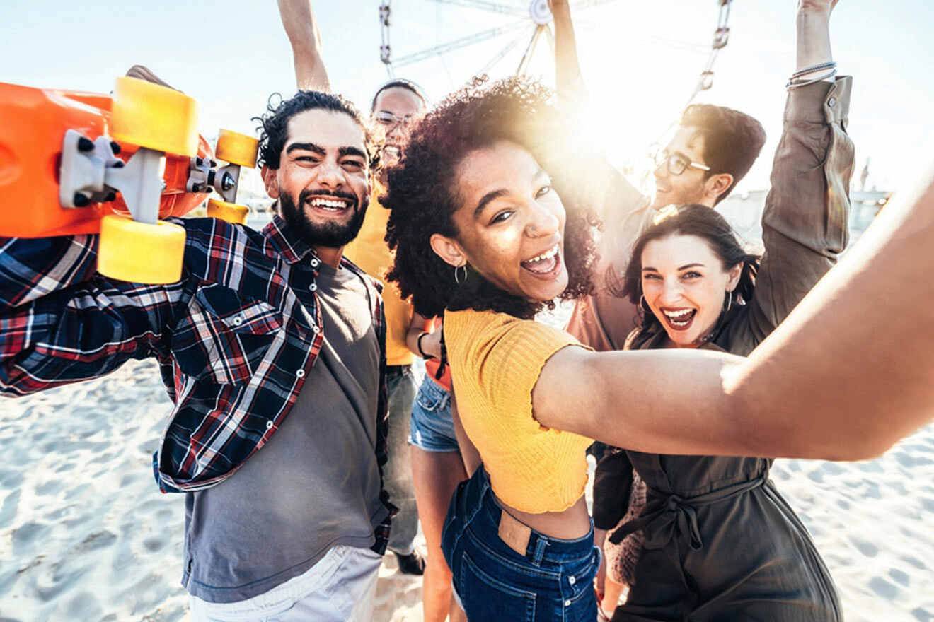 friends having fun at a music festival on the beach