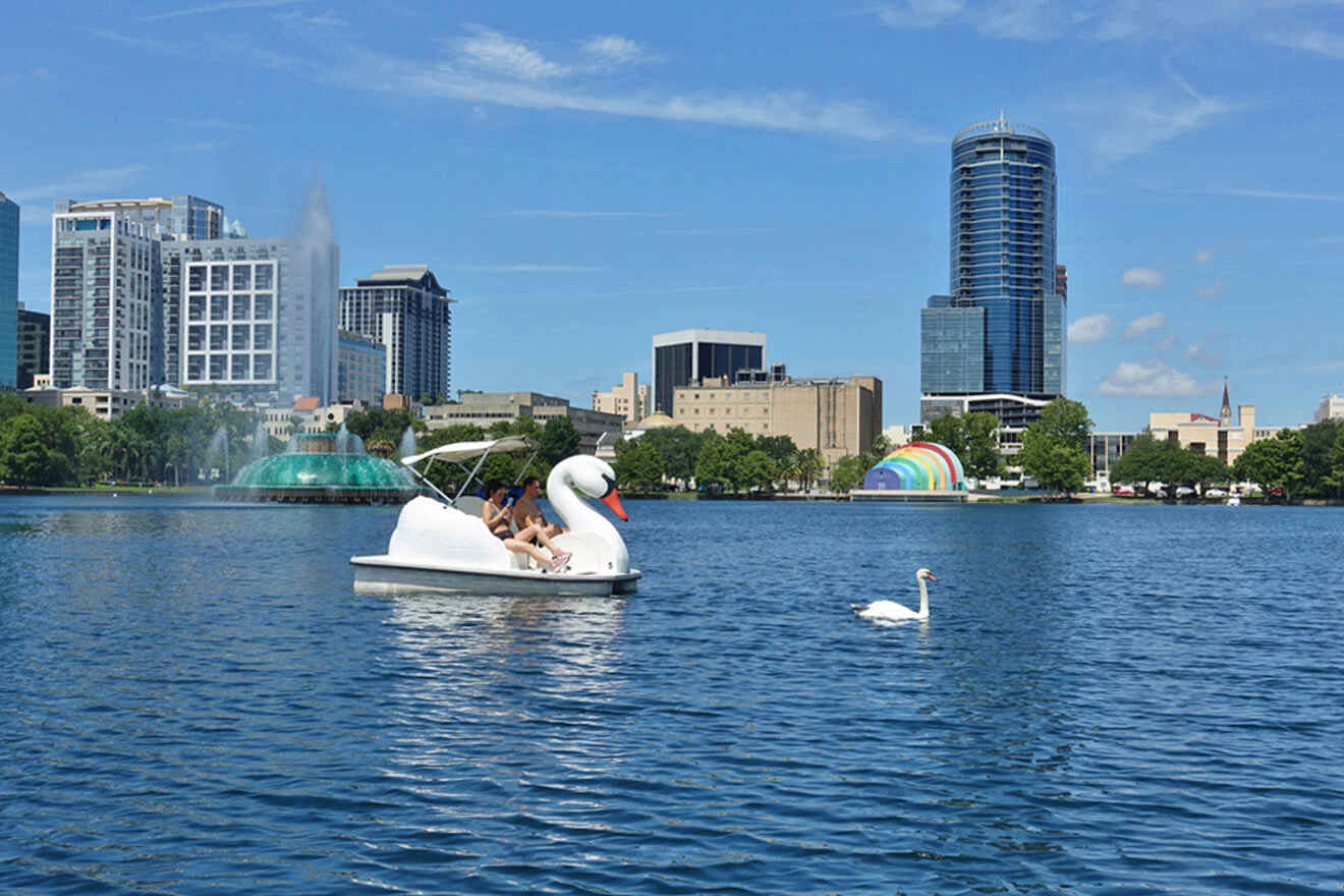 people in a pedal-powered swan boat on Lake Eola