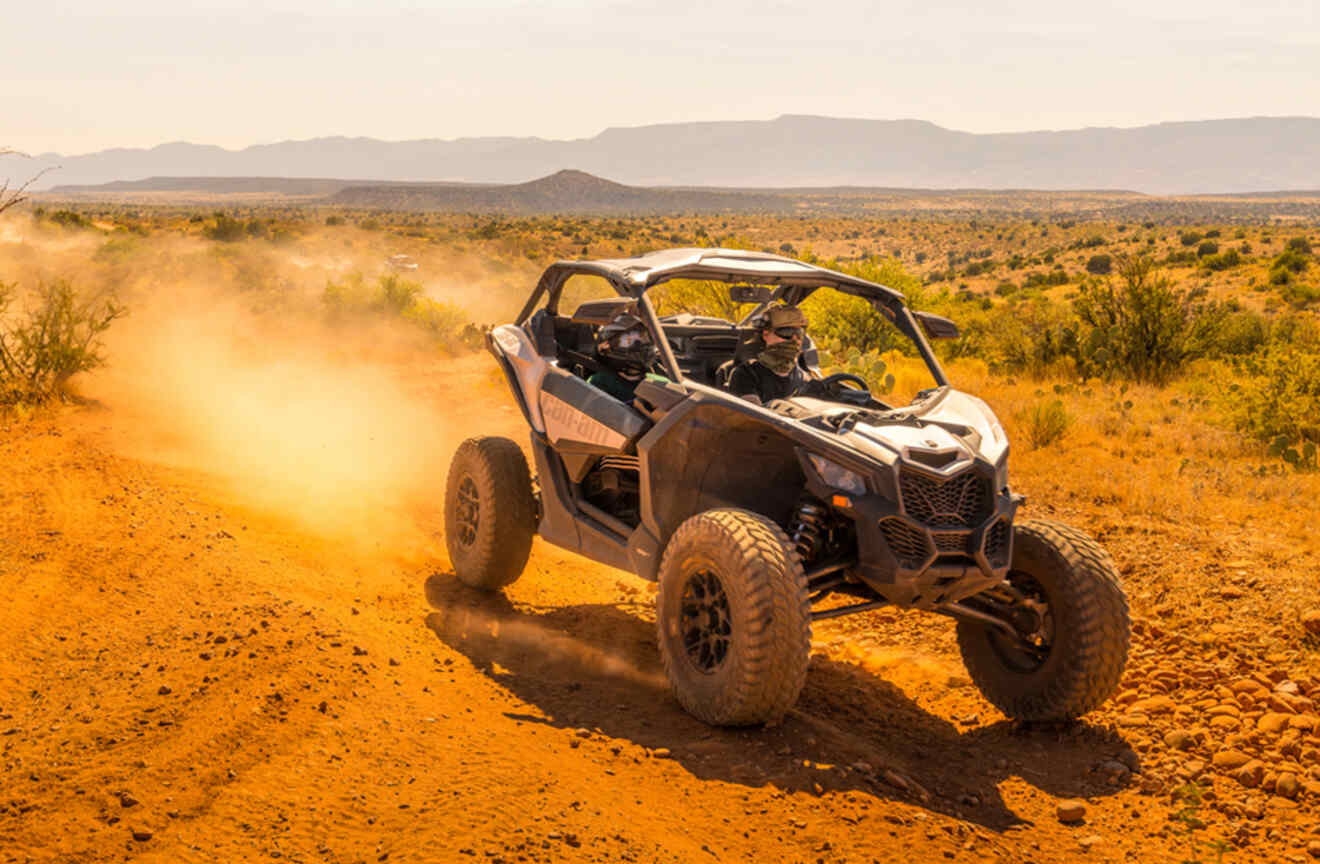 A person driving an ATV in the Sedona desert