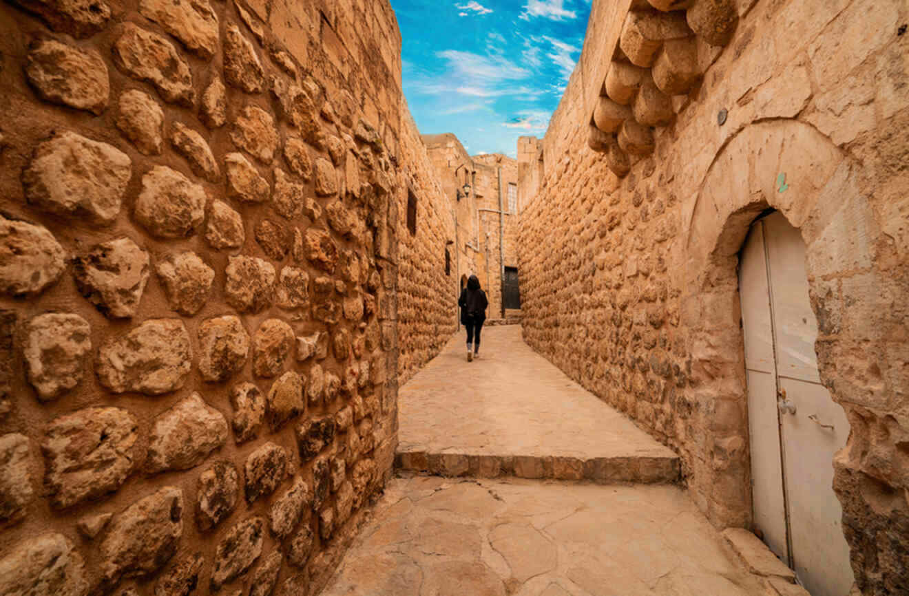 A girl walking in the narrow streets in Madrin