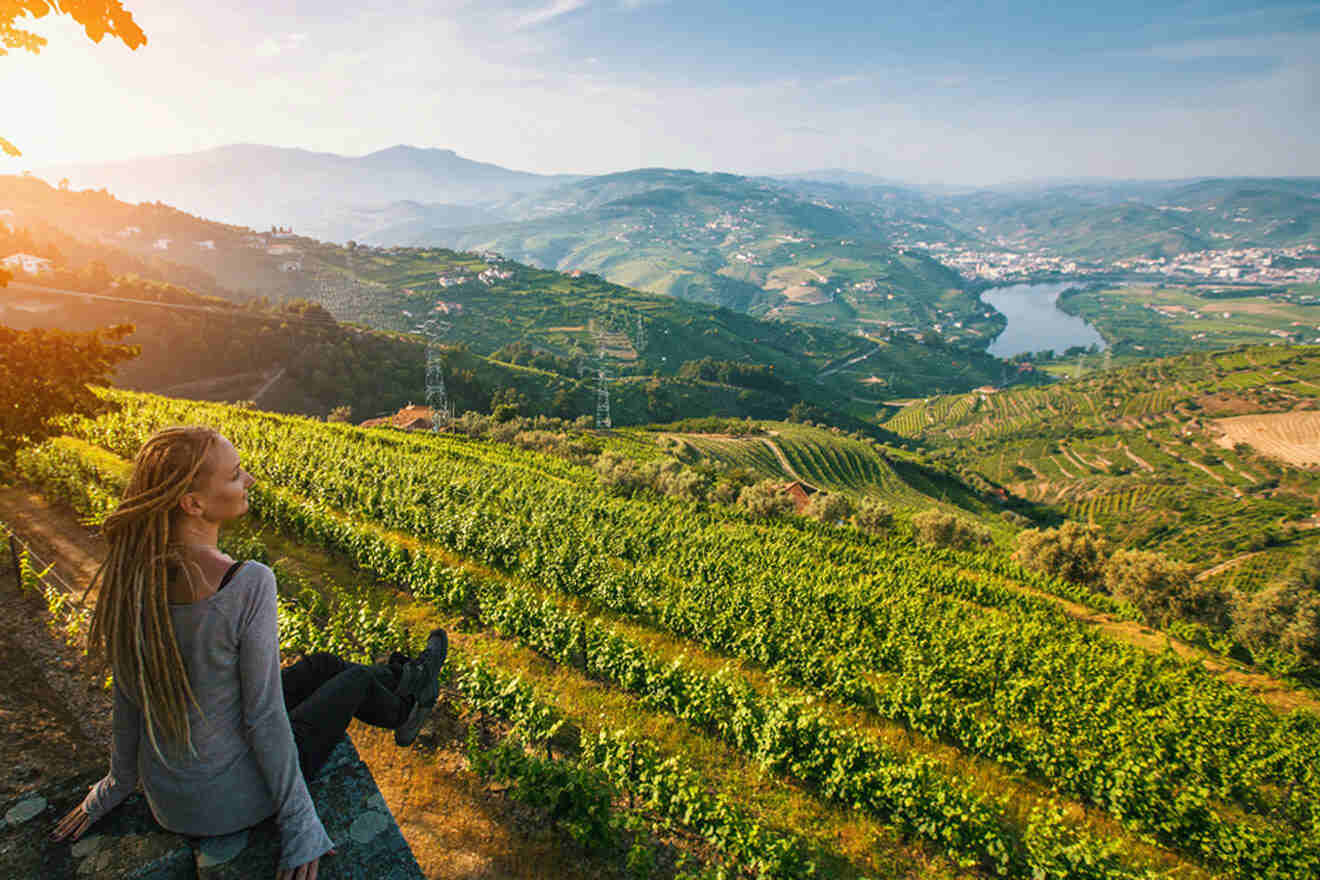 woman watching over the vineyards 