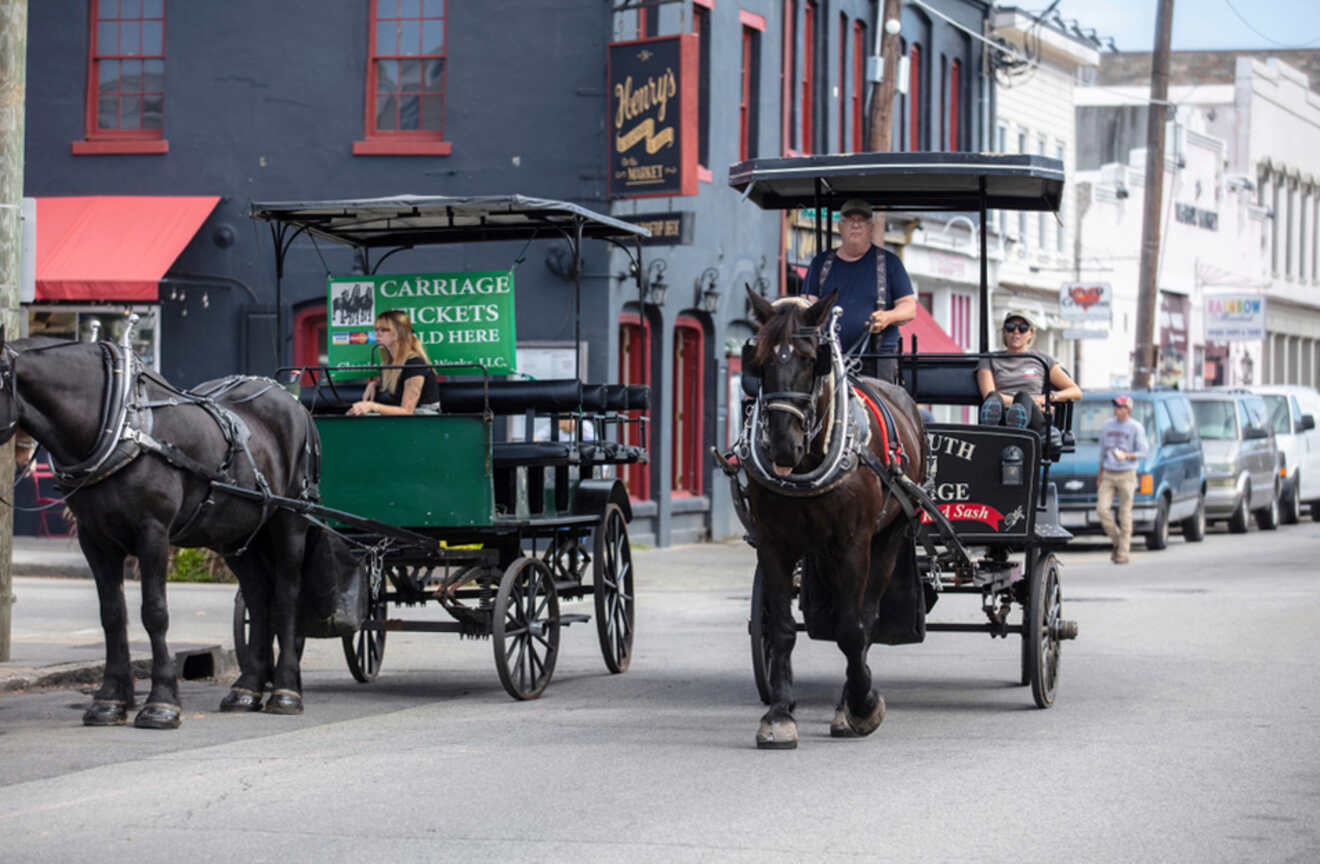 2 horse-drawn carriages on a Charleston street