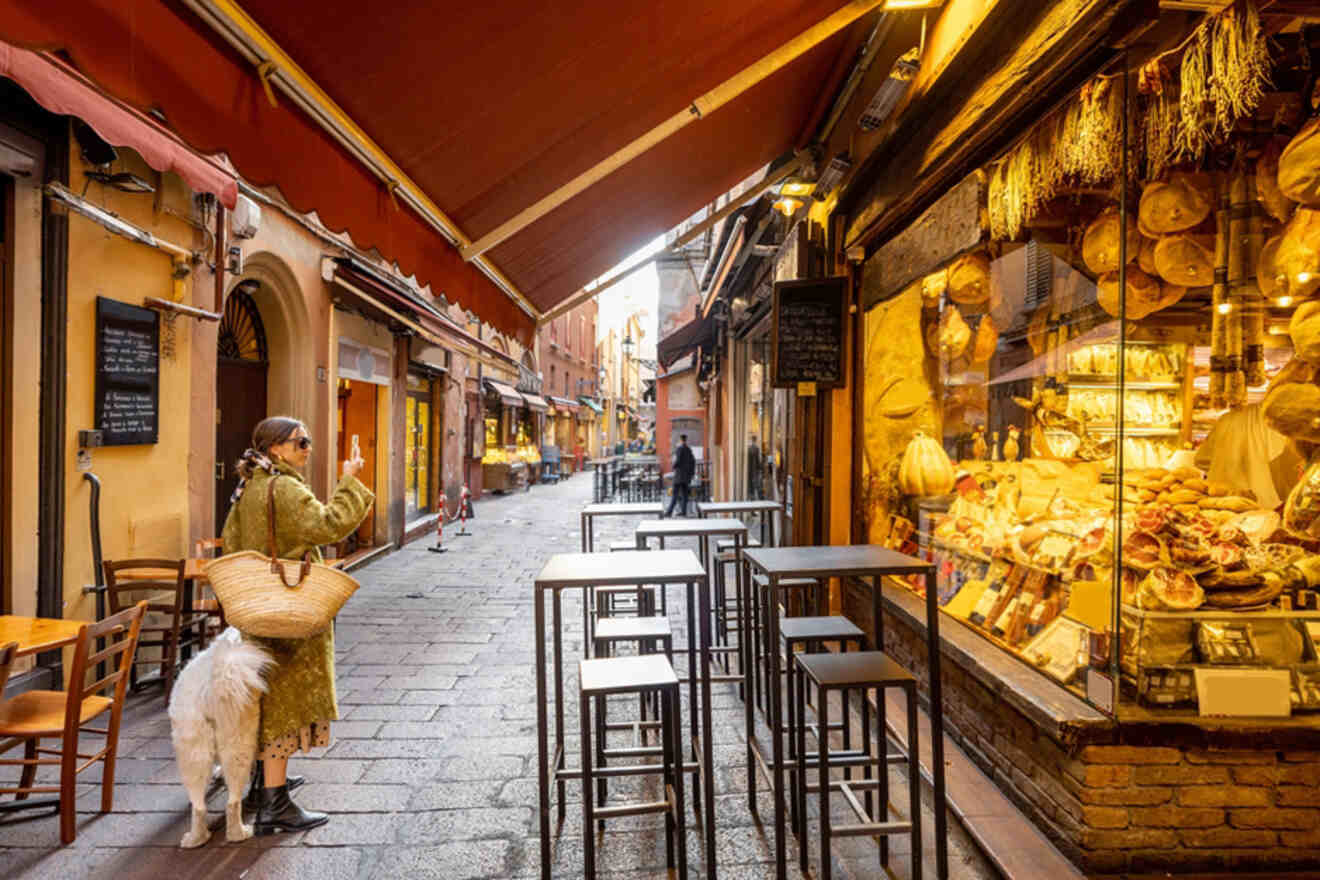 Street in bologna in front of a deli