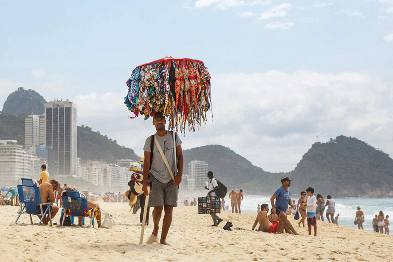 merchant on the beach selling swimsuits