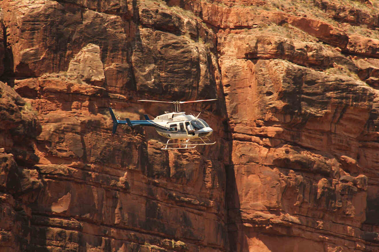 helicopter flying over the grand canyon