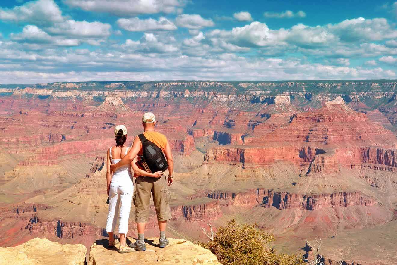 couple watching Grand Canyon view 