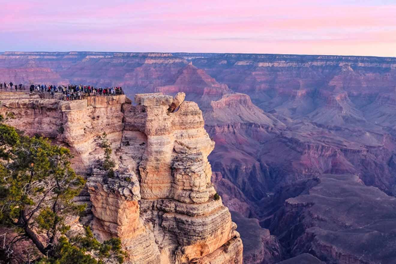 tourists enjoying the sunset at Grand Canyon