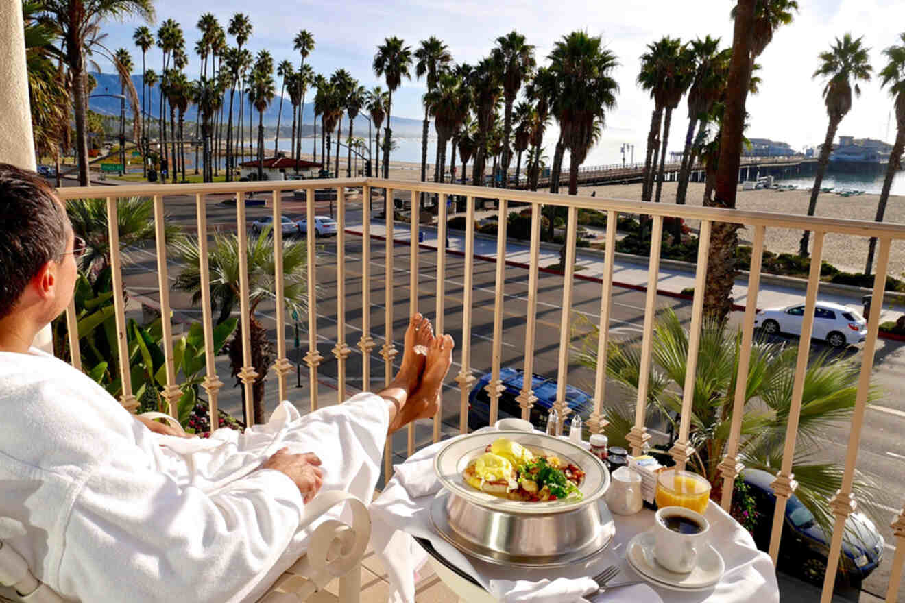 man having breakfast on the balcony
