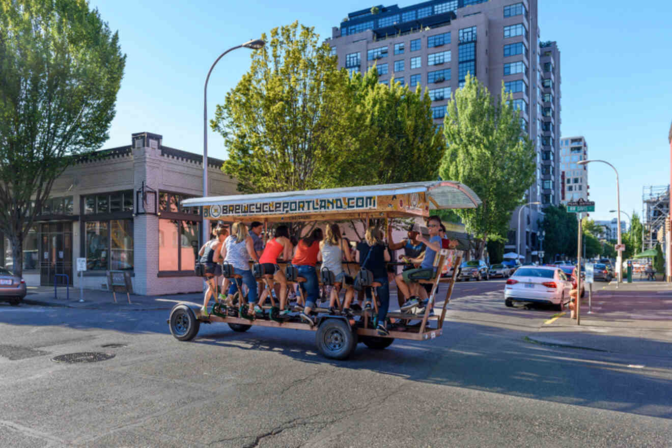 A group of people riding on a bike trolley for 12 people