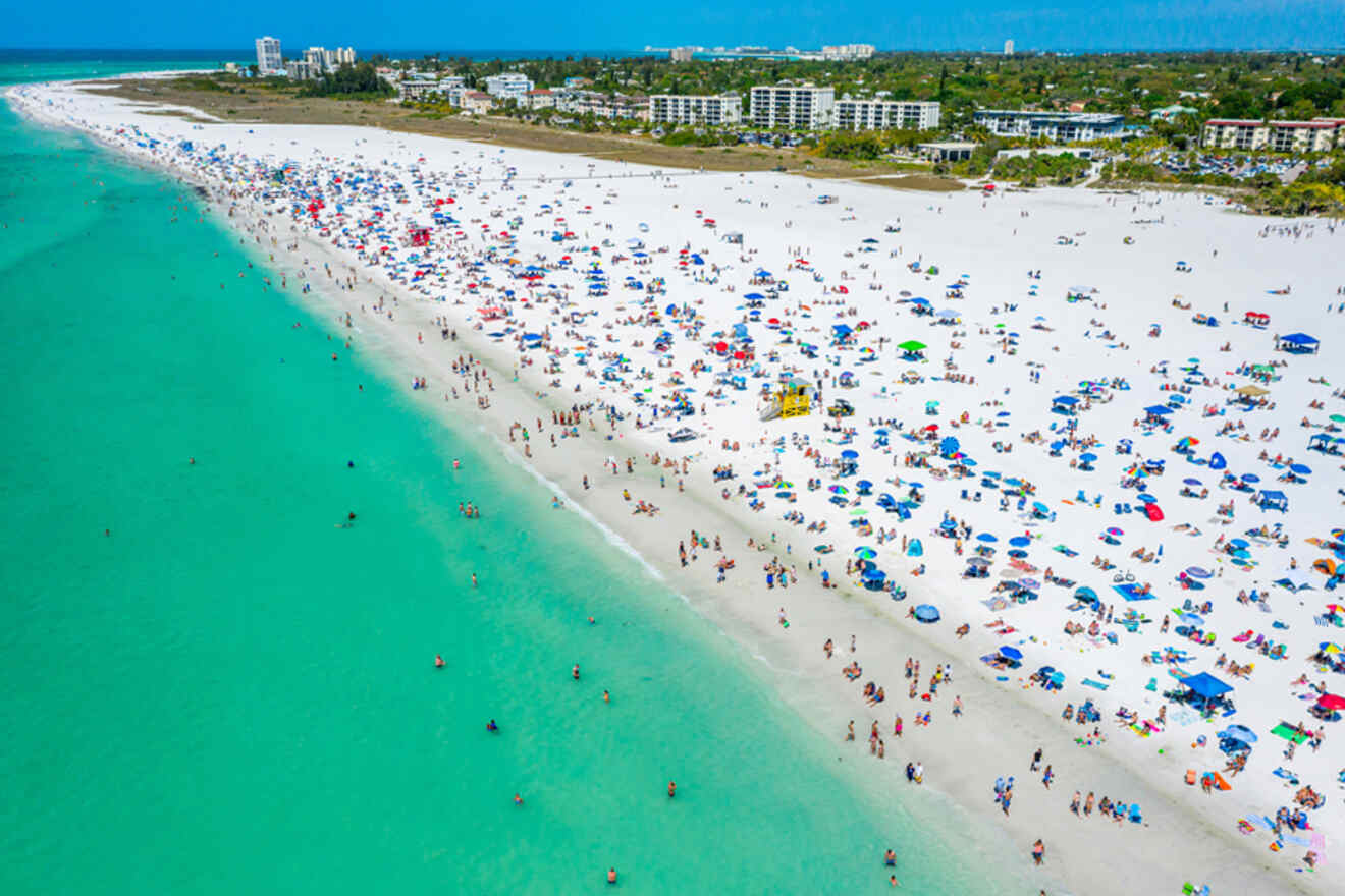 aerial view over a busy white sand beach in Sarasota