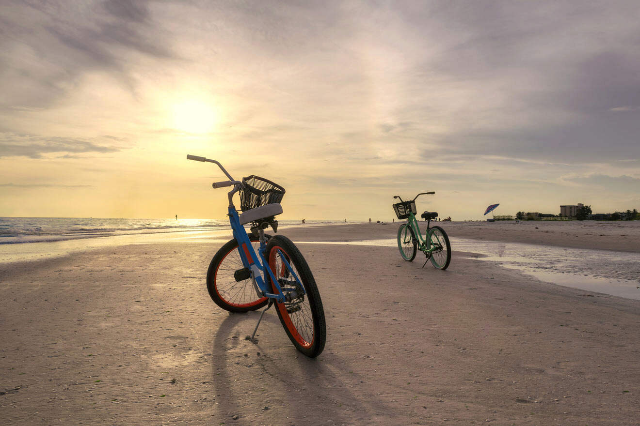 electrical bikes on a beach, sunset