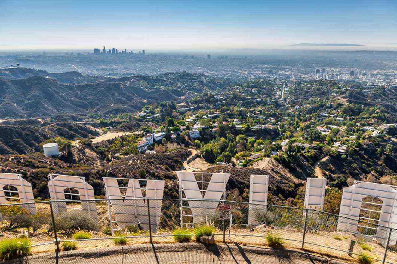 a view of the backside of Hollywood sign from the top of a hill