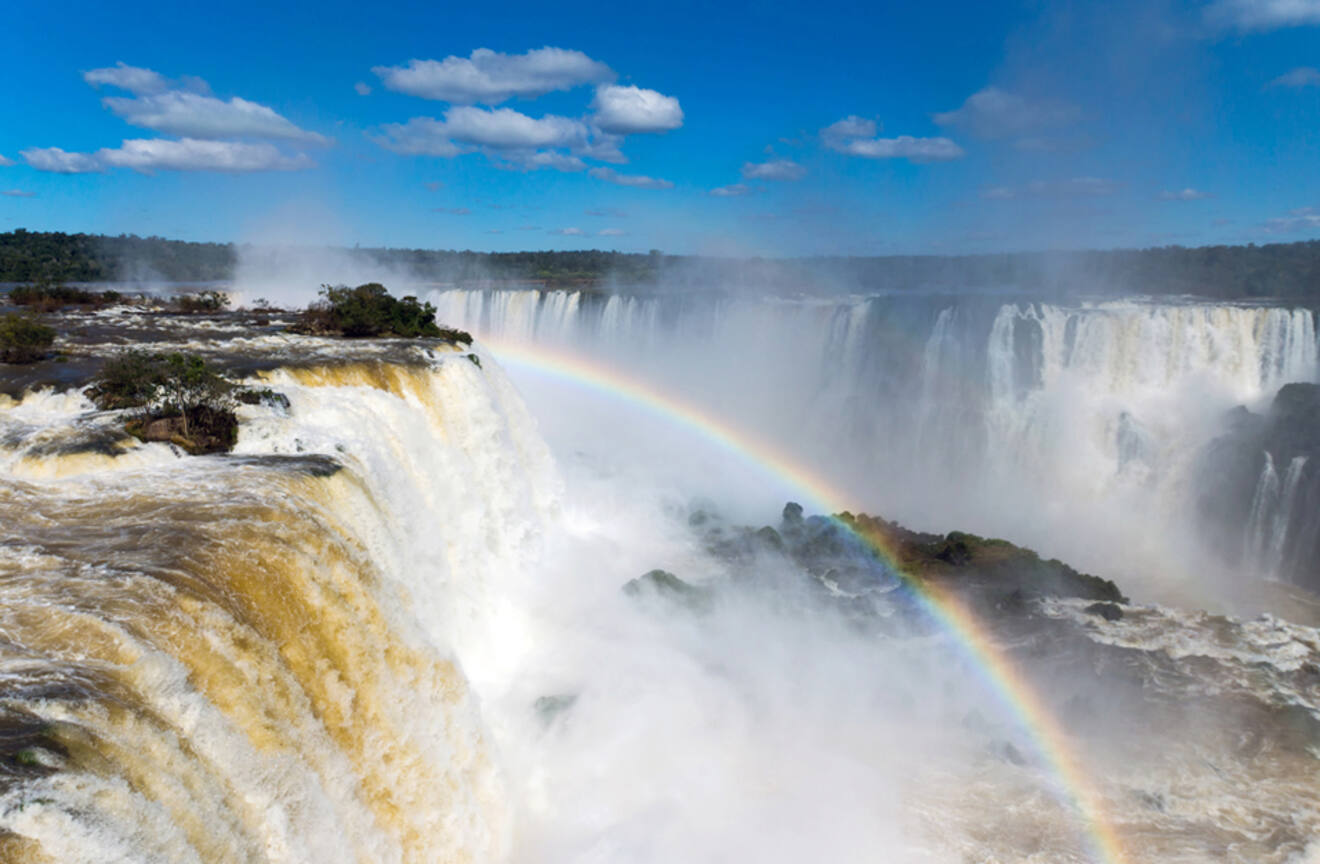 View of Iguazu Falls with rainbow