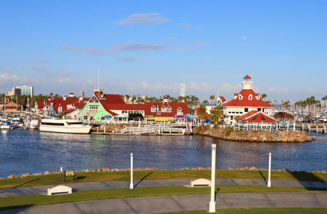 a view of a harbor with boats and buildings in the background