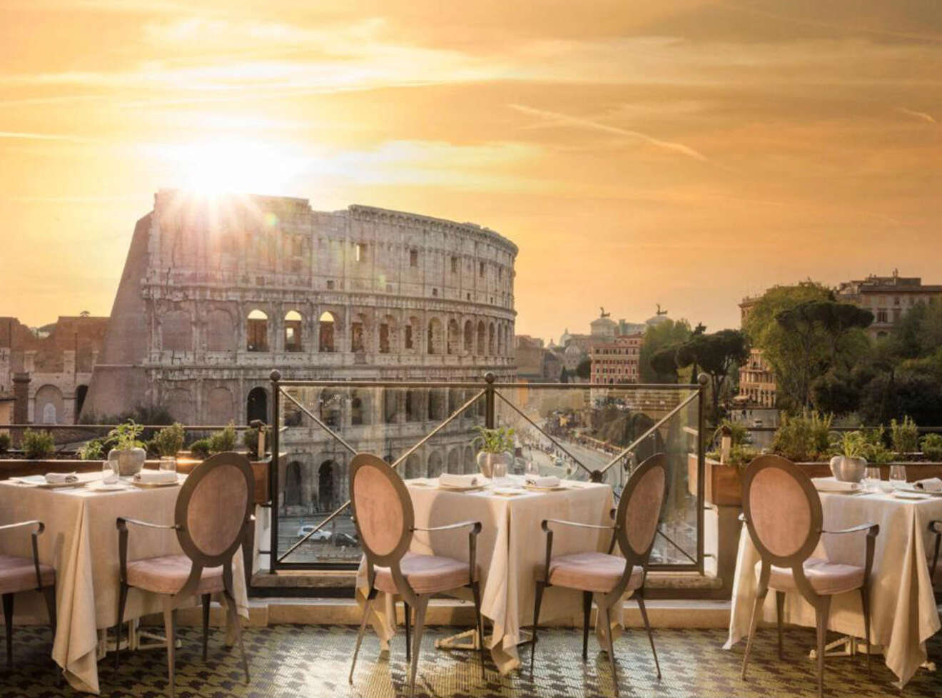 View of the Colosseum from a hotel restaurant at sunset