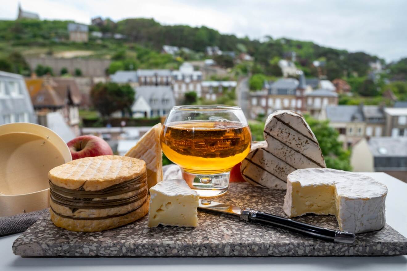View of cheeses and cider
