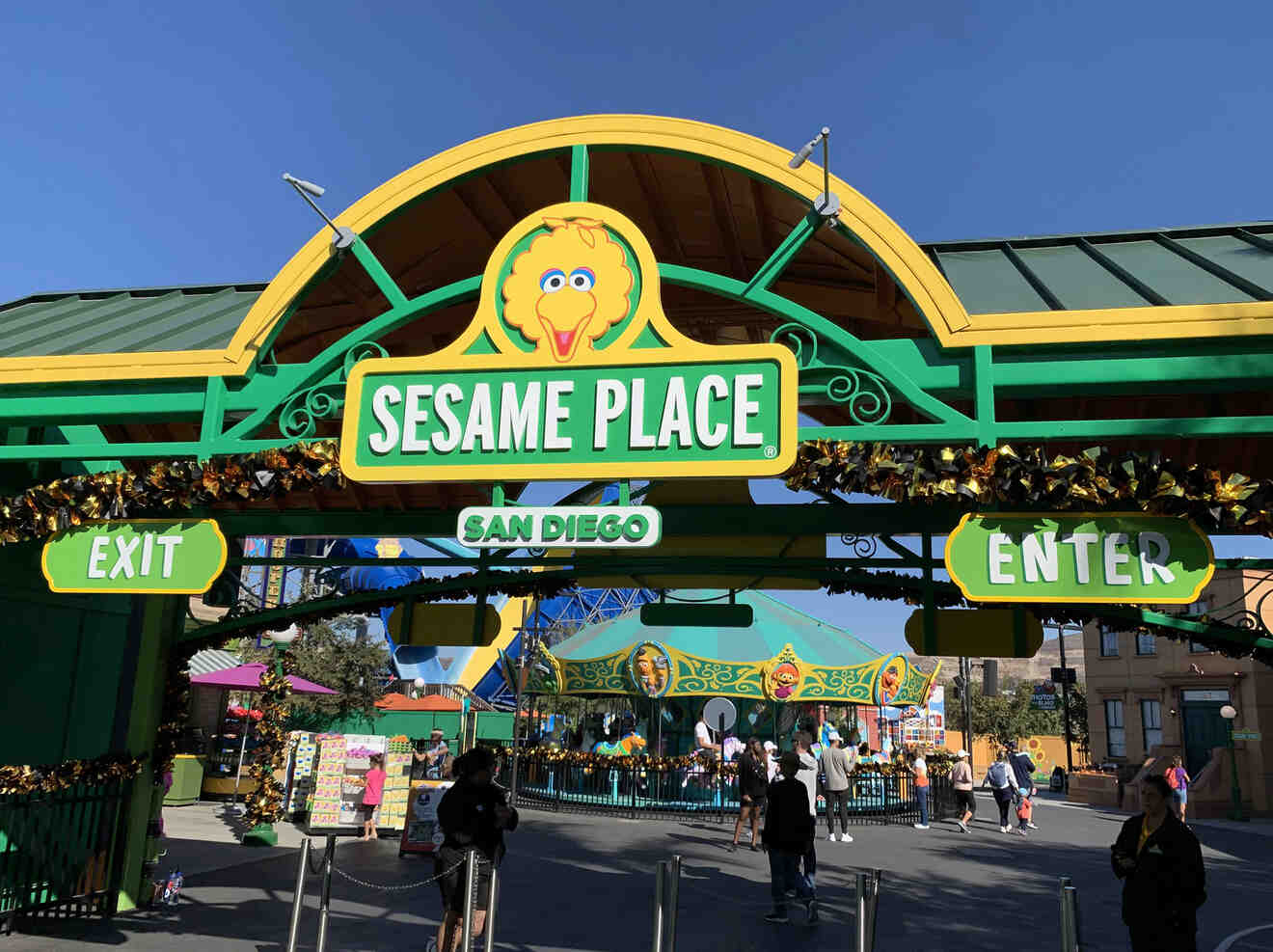 the entrance to sesame place at an amusement park