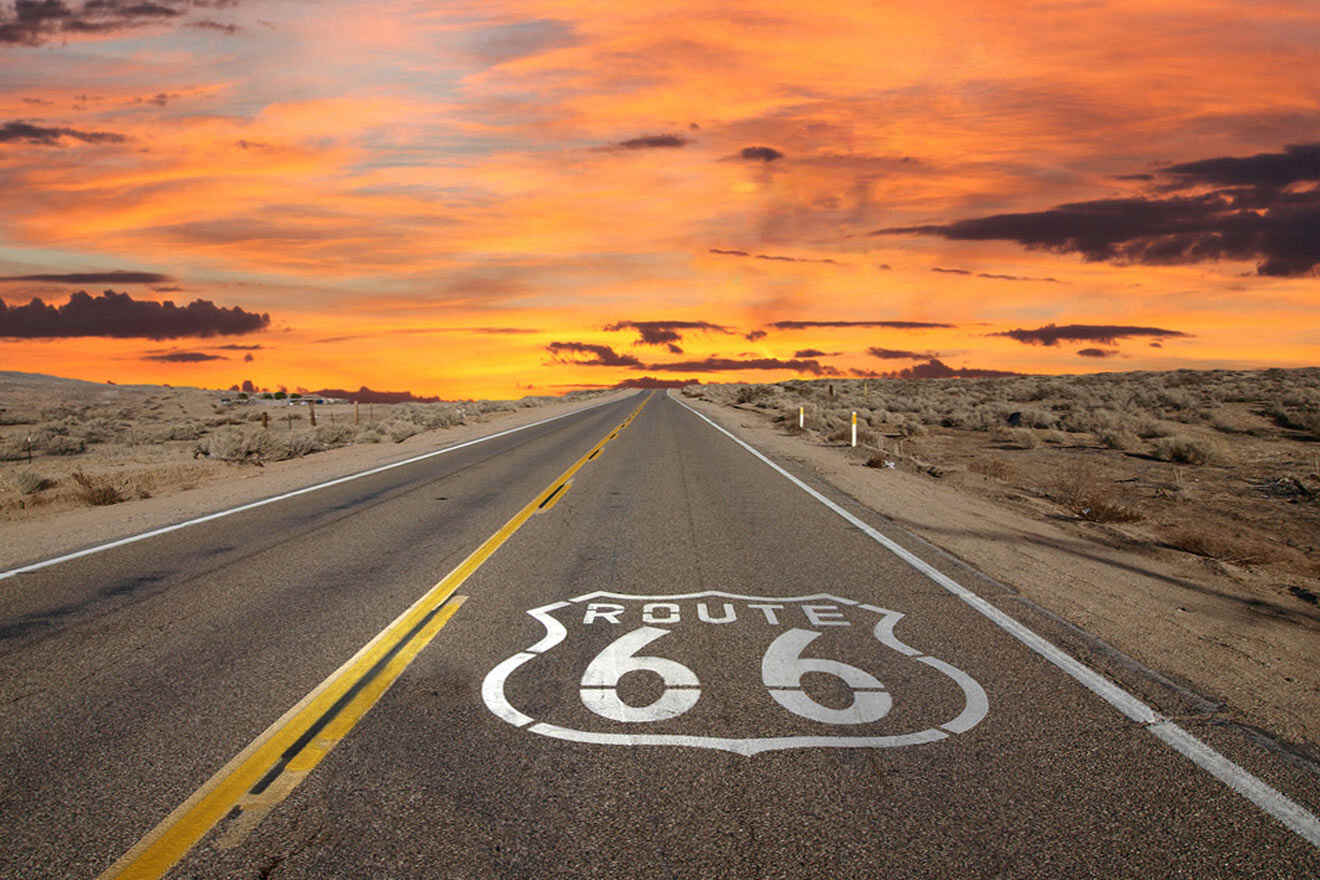 a route 66 sign painted on the side of a road