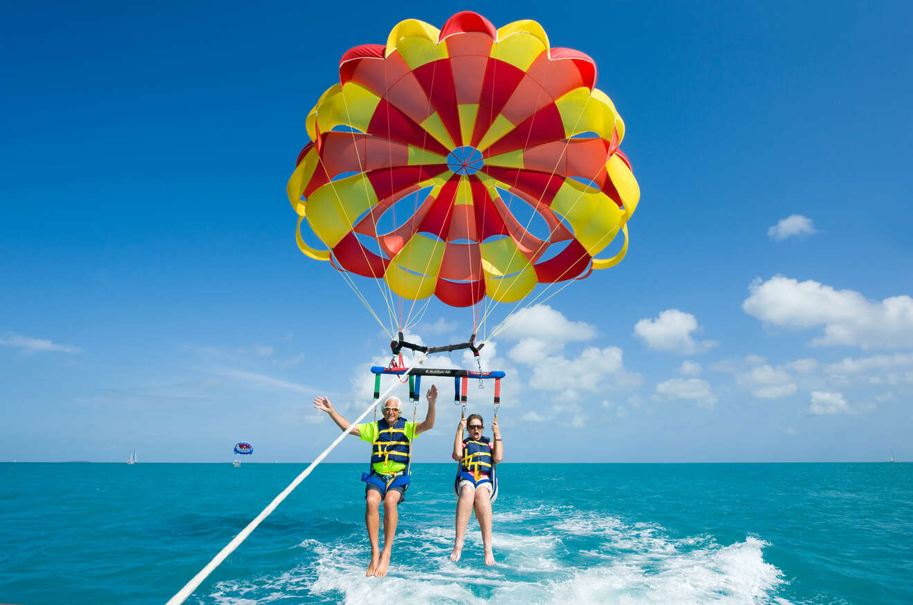 Man and woman parasailing