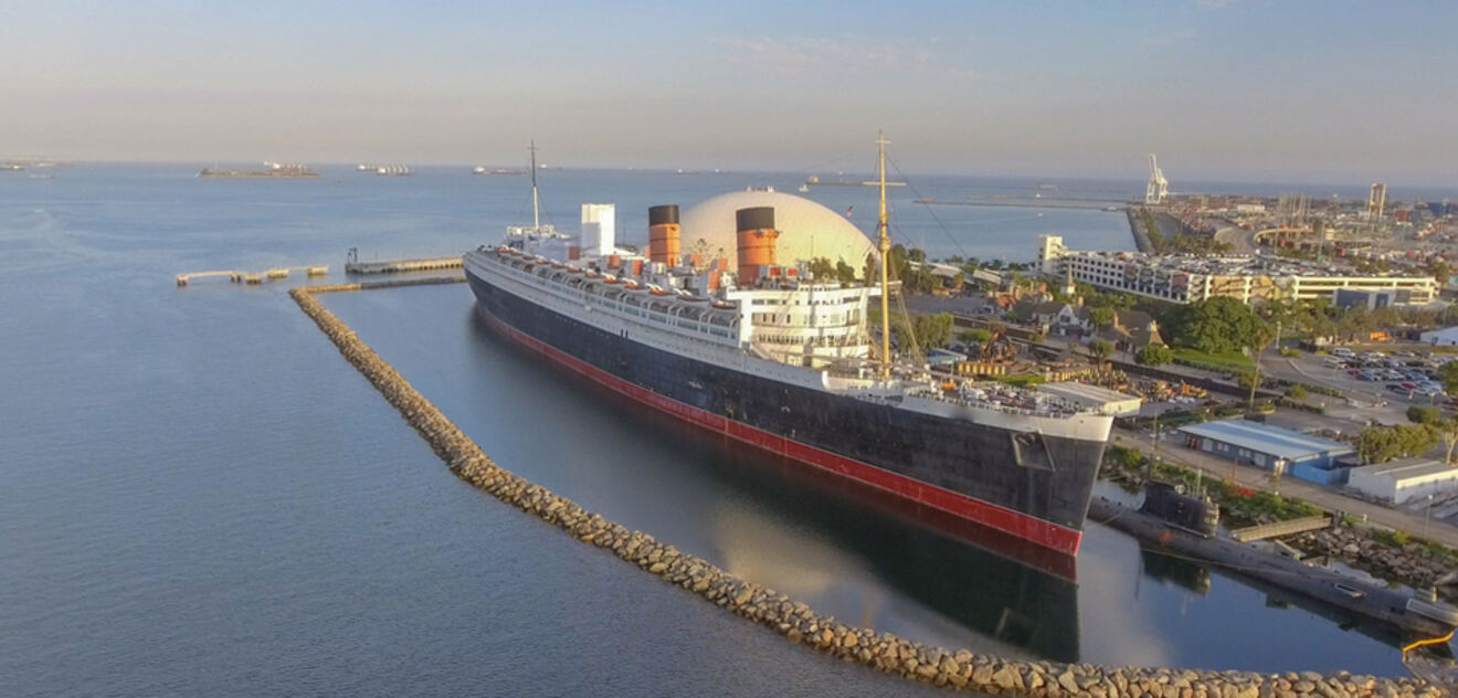 a large boat is docked in the water