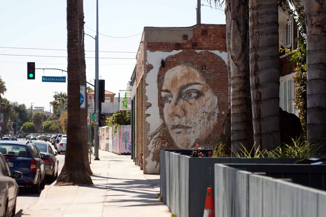 street art with a woman's face on the side of a building