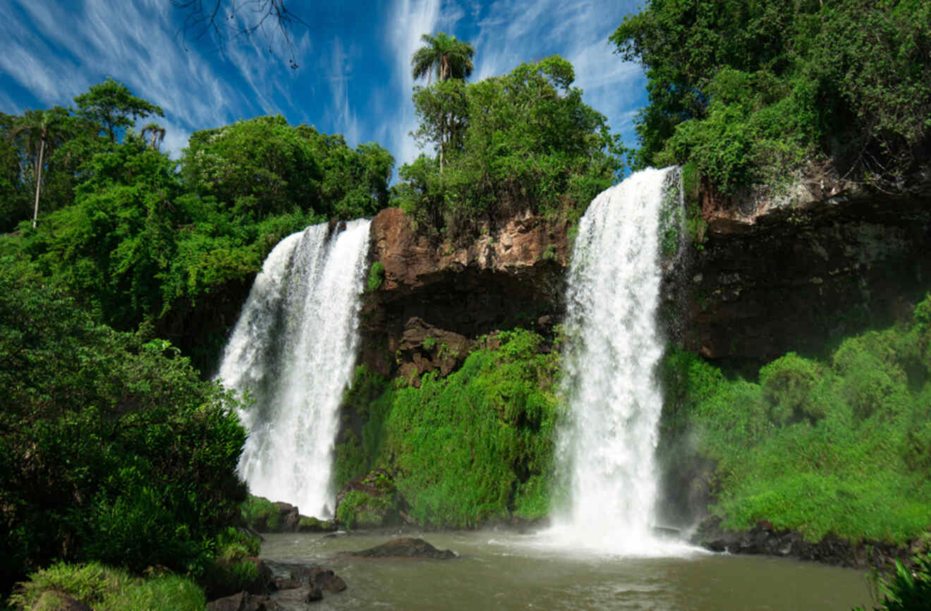 a large waterfall with water cascading down the sides