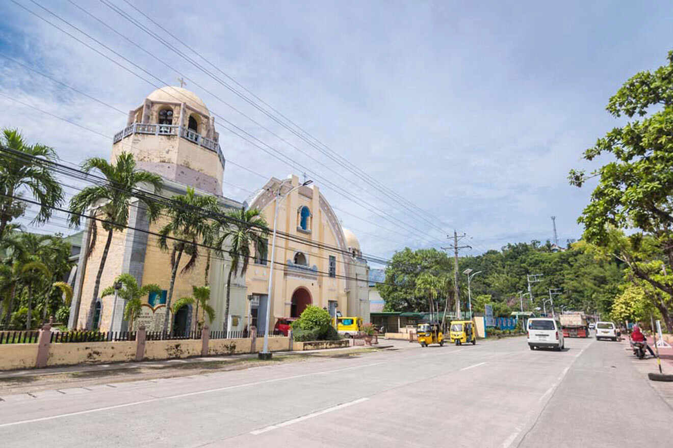 a large church on the side of a street