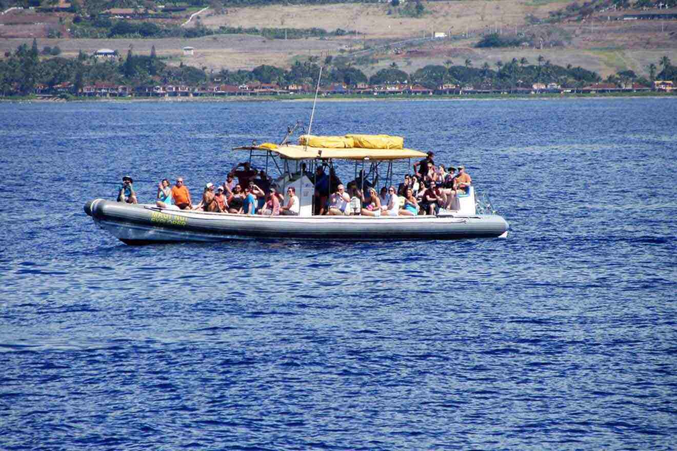 a group of people on a boat in the water