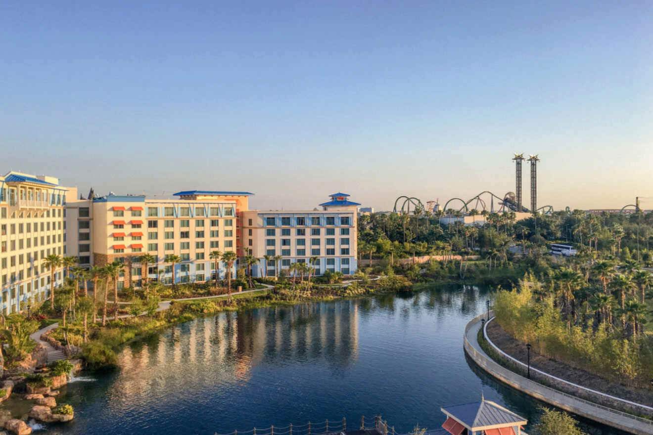 Hotel with water area and roller coaster in the background