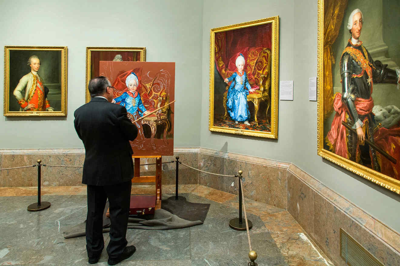 man watching art at Prado Museum