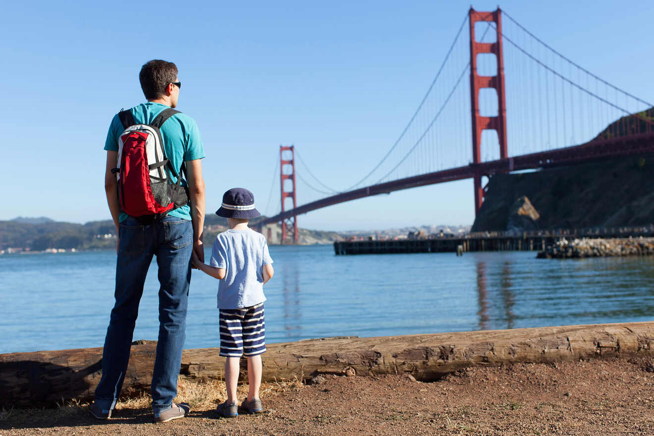 A father and his son looking at Golden Gate Bridge
