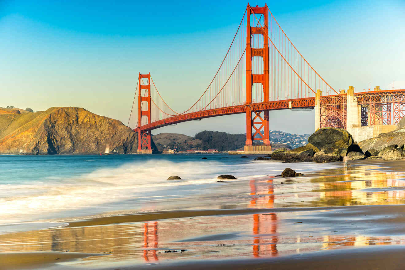 a view of the golden gate bridge from the beach