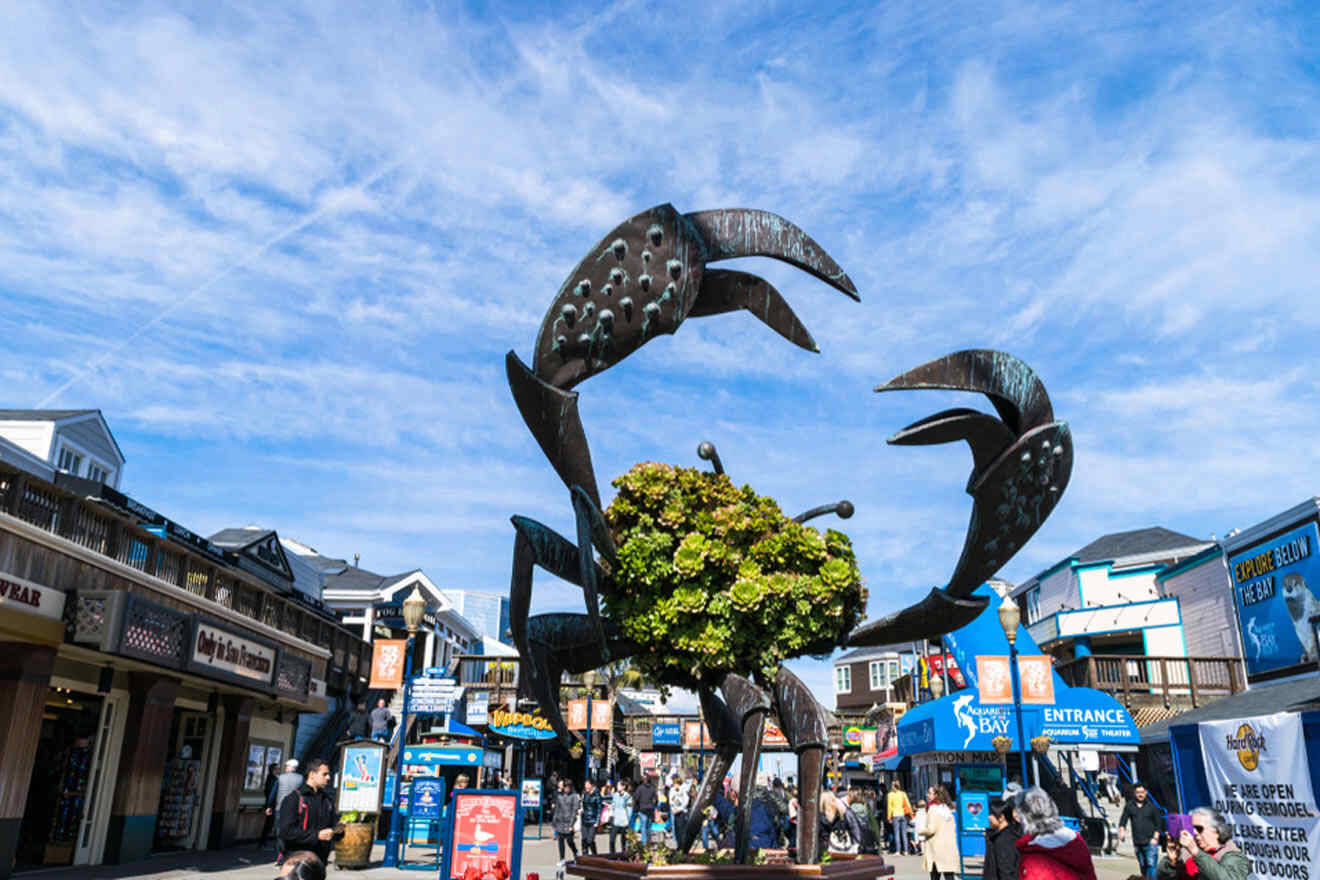 a statue of a crab in the middle of a street