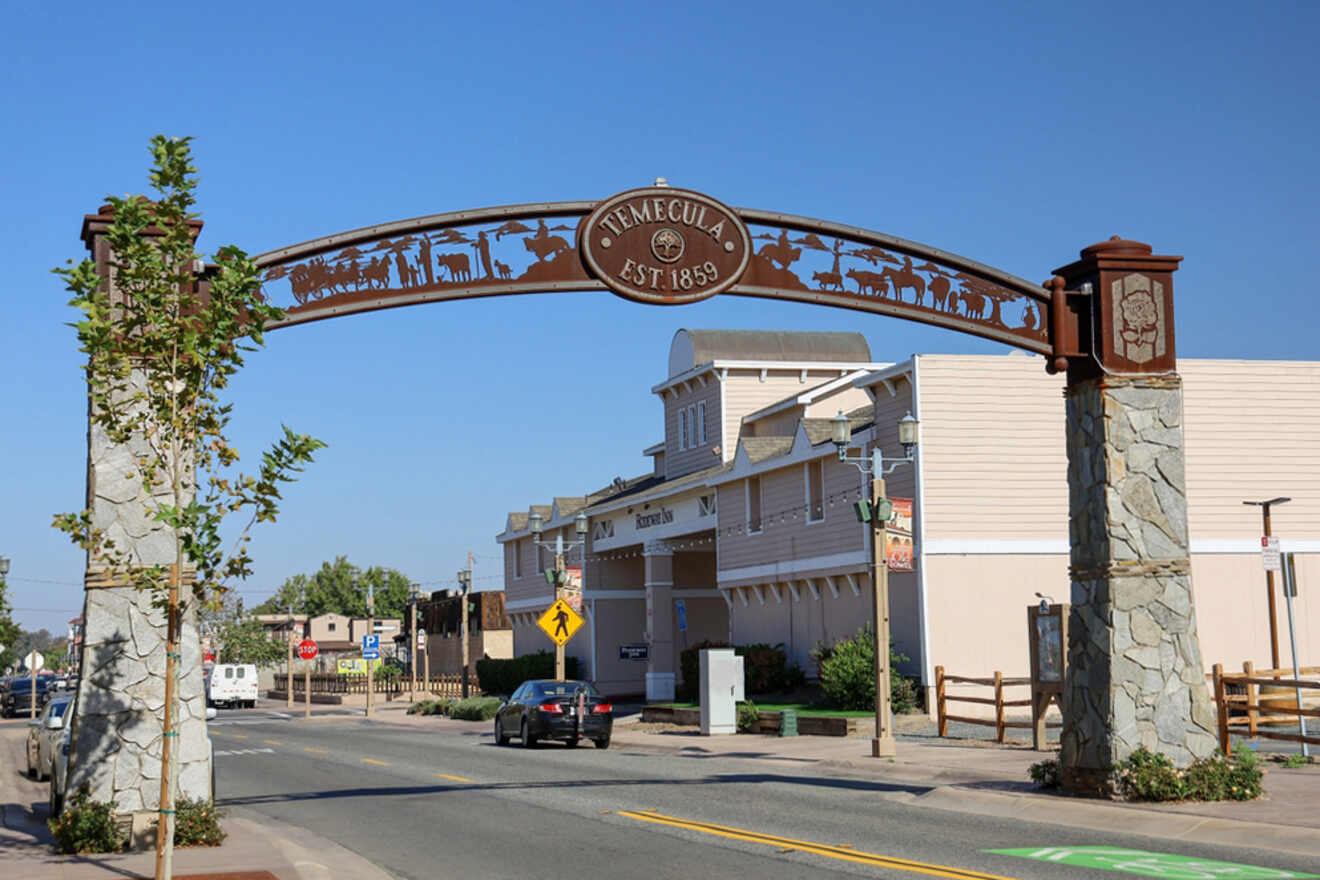 sign above the road with Temecula written on it