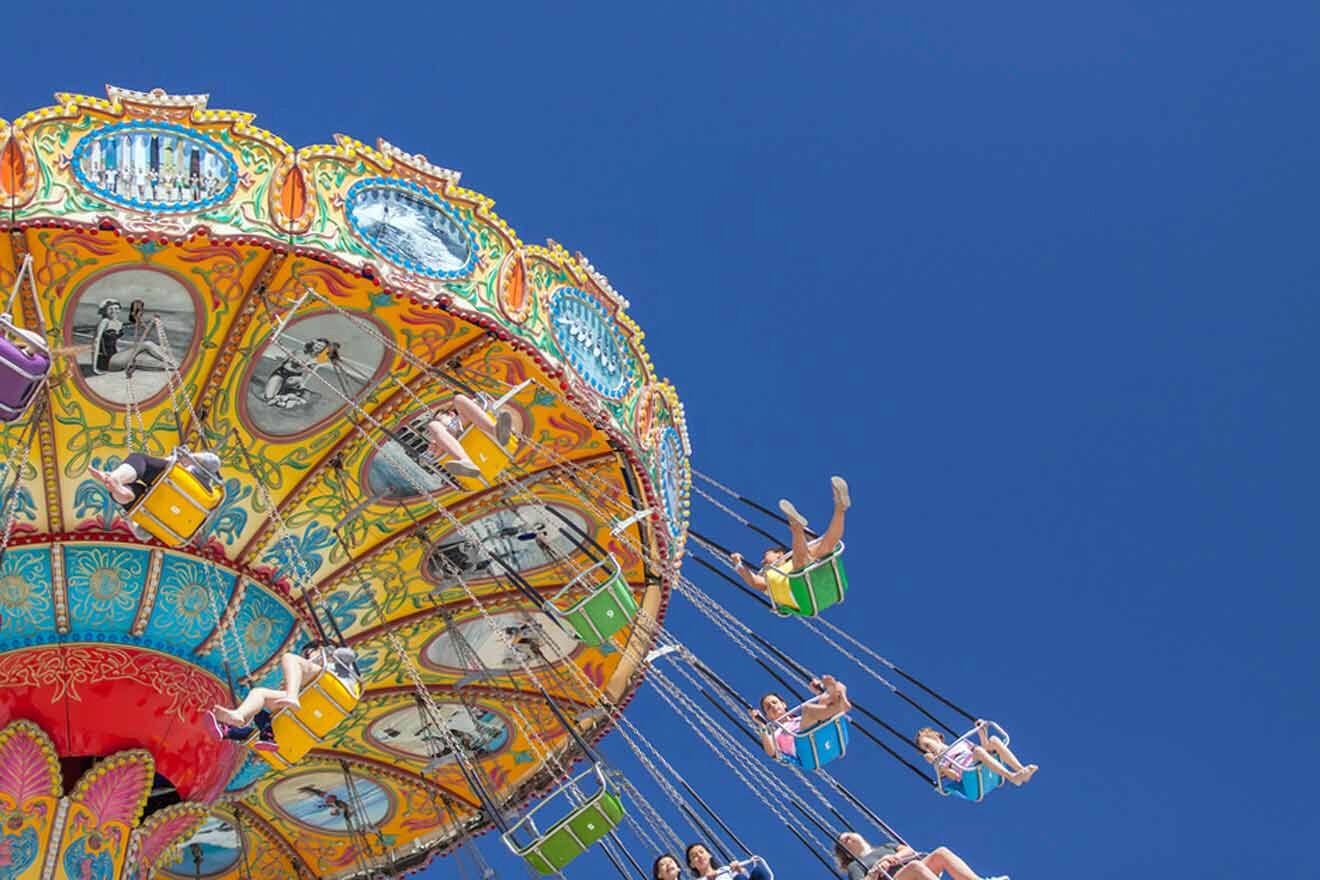 people riding carousels