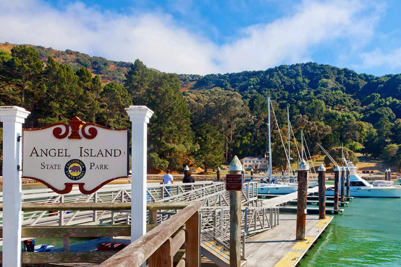 a pier with a sign that says angel island state park