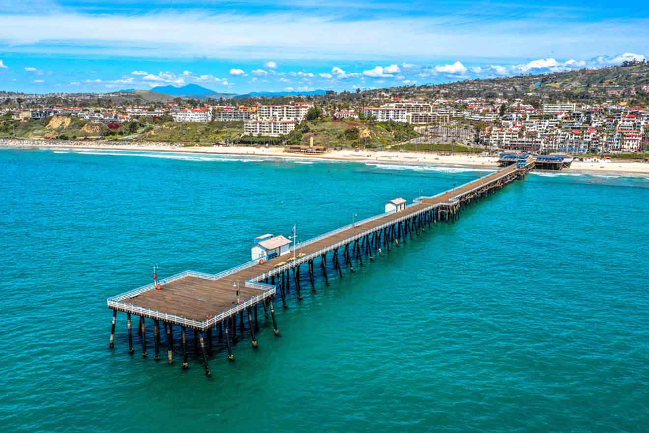 a pier in the middle of a body of water