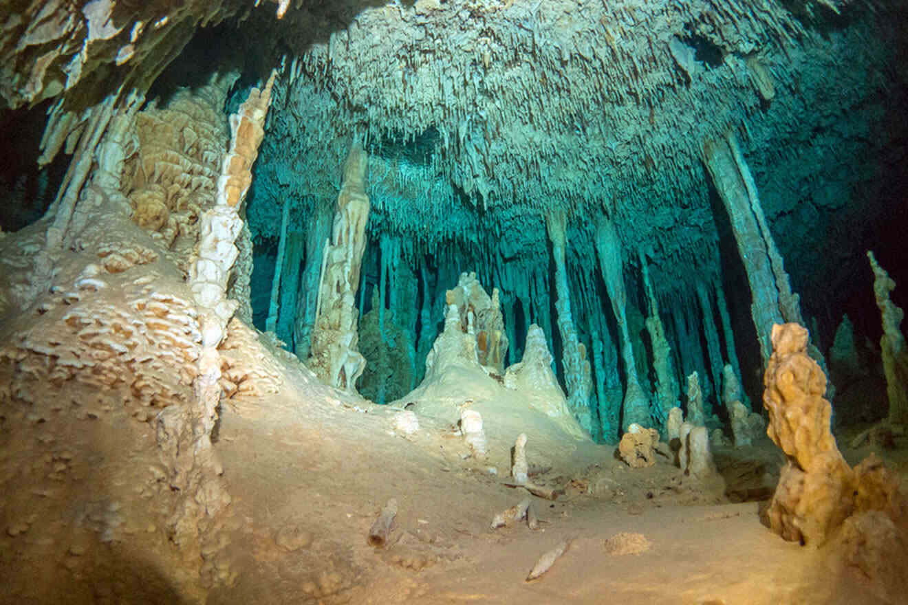 a cave filled with lots of water and rocks