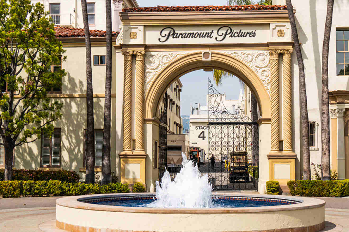 paramont pictures entrance and a fountain in front of it