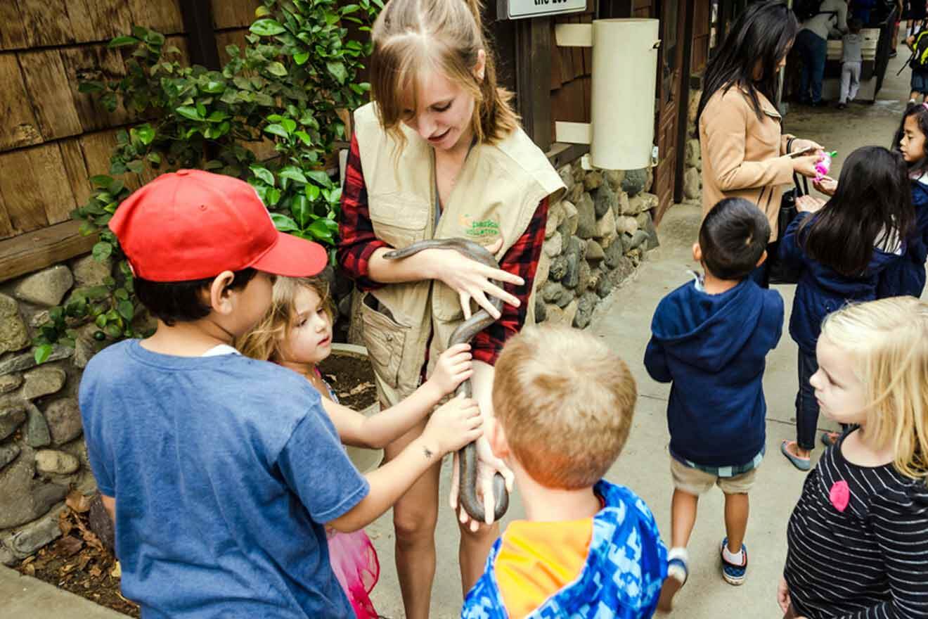 a group of children standing around each other