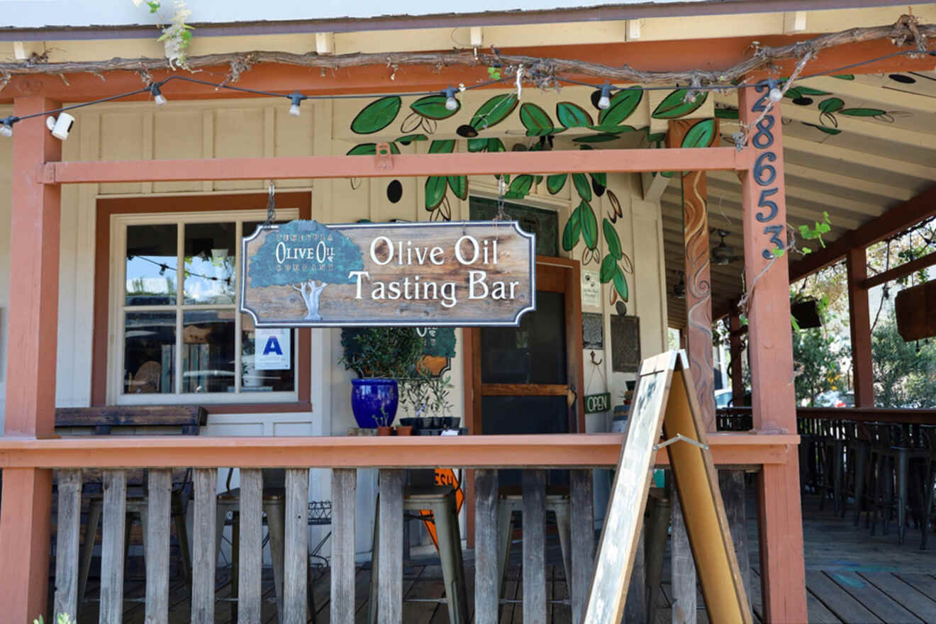a sign on a shop - olive oil tasting bar