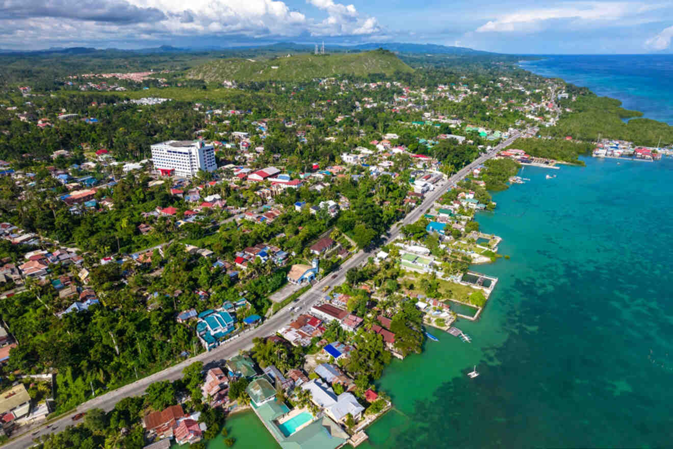 a bird's eye view of a small town by the ocean